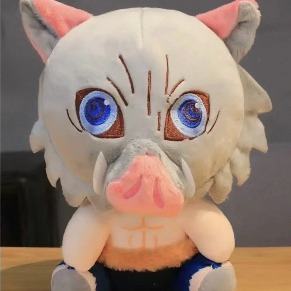 Gray and Pink Plush Toy with Blue Eyes